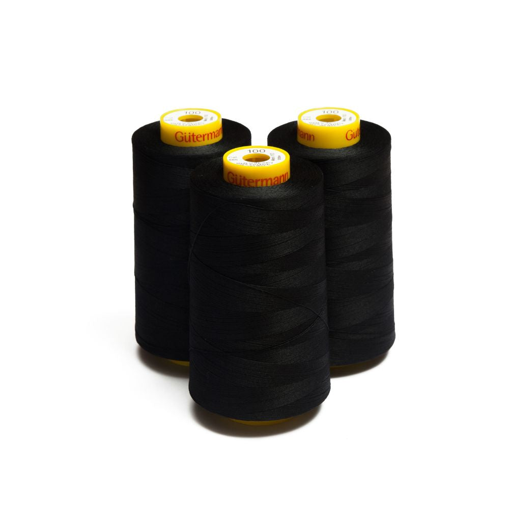 Gutermann A302 100% polyester thread in 1000m reels, available in multiple colours: Black (000), White (800), Navy (665), Beige (198 & 249), Red (367), Lavender (391 & 759), Charcoal (2958), and more.